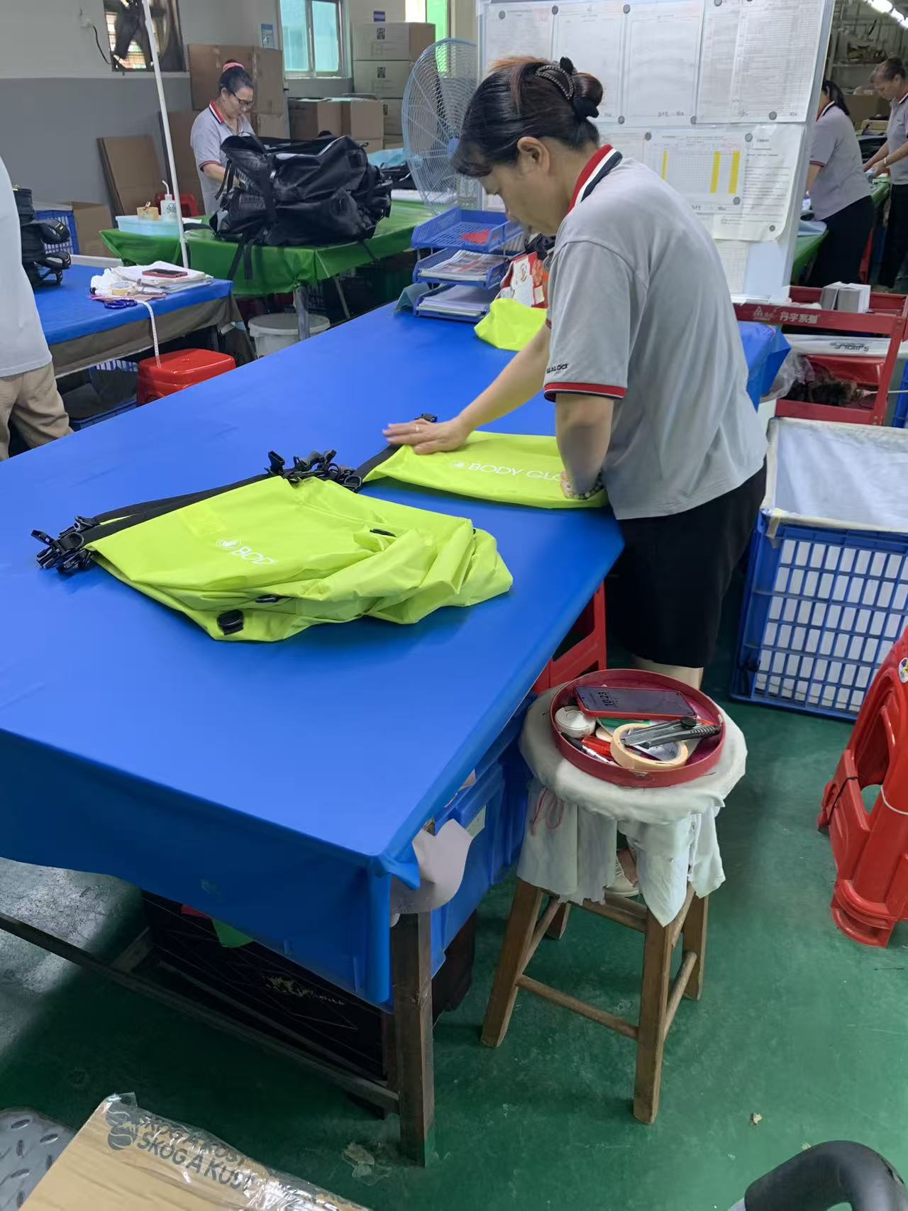 How a High-Visibility Roll-Top Dry Bag Order Gets Sewn, Checked and Boxed